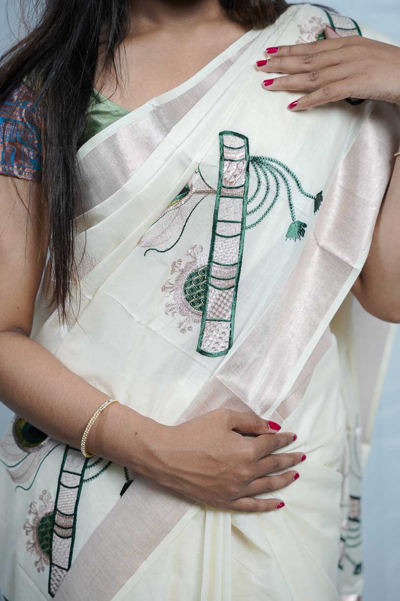 White Cotton Handloom Saree with Bamboo Flute Stitched Design