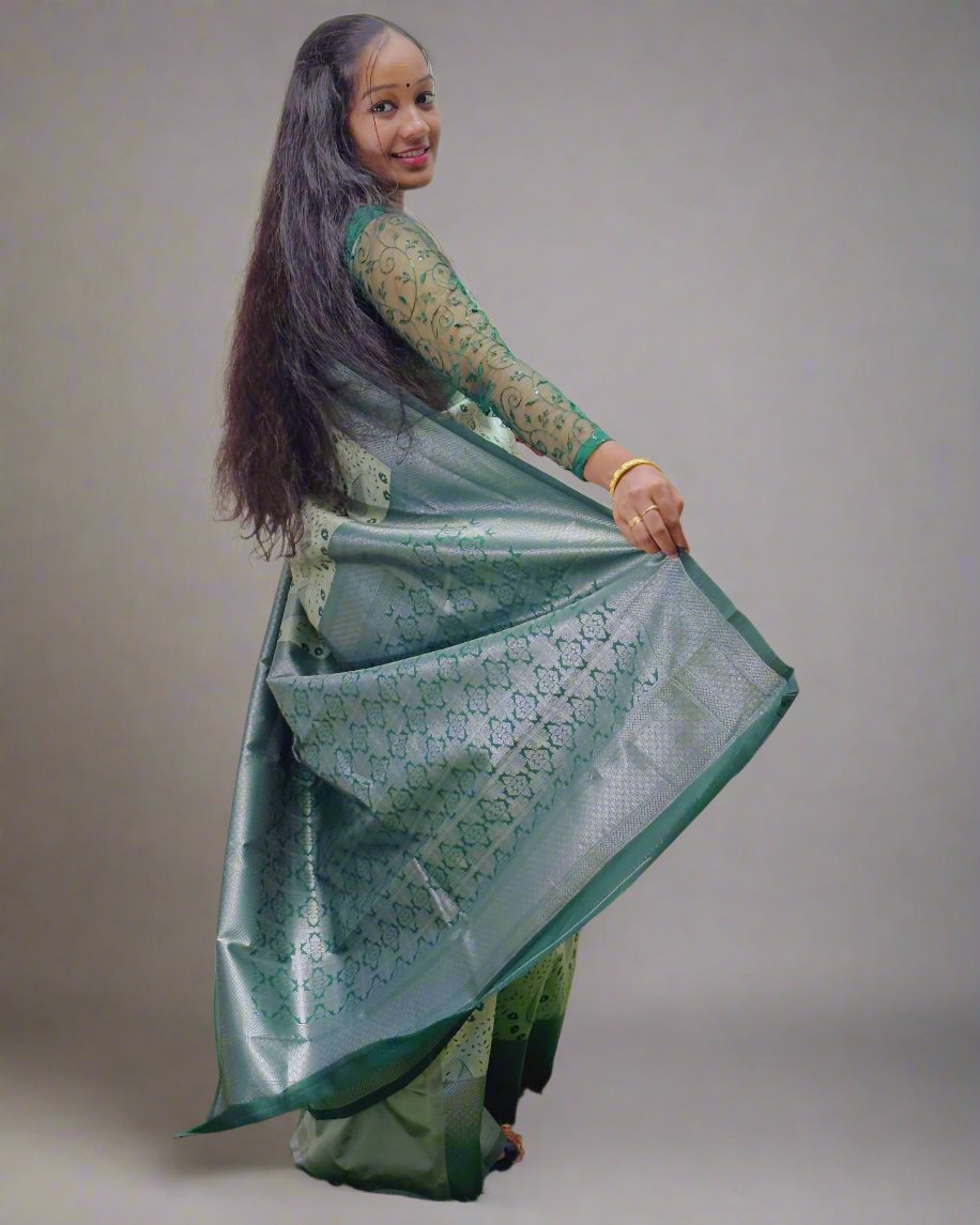 Handloom Green Silk Saree with Floral Motifs Product Description:
