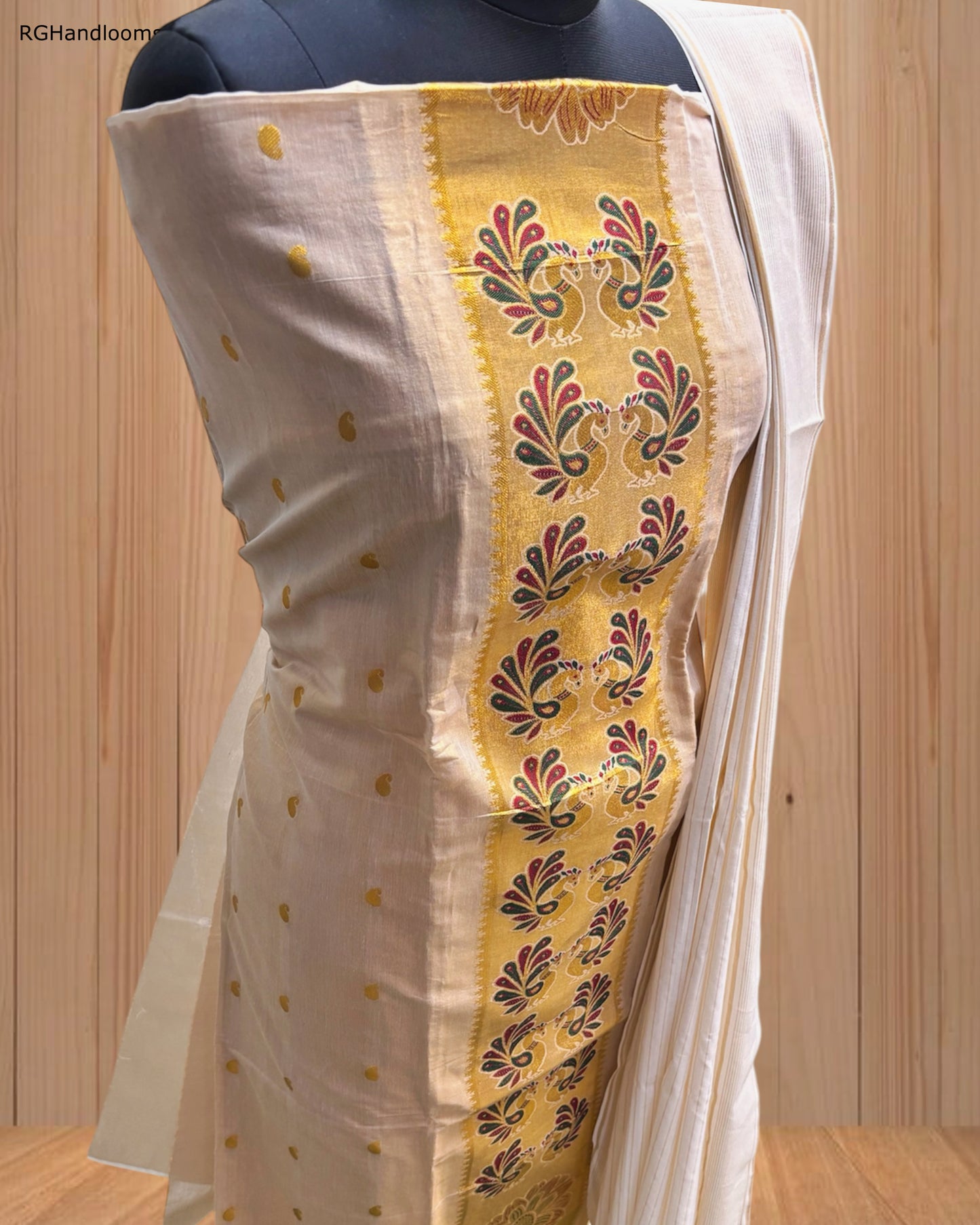 Ivory Churidar Material with Graceful Peacock Design & Golden Border