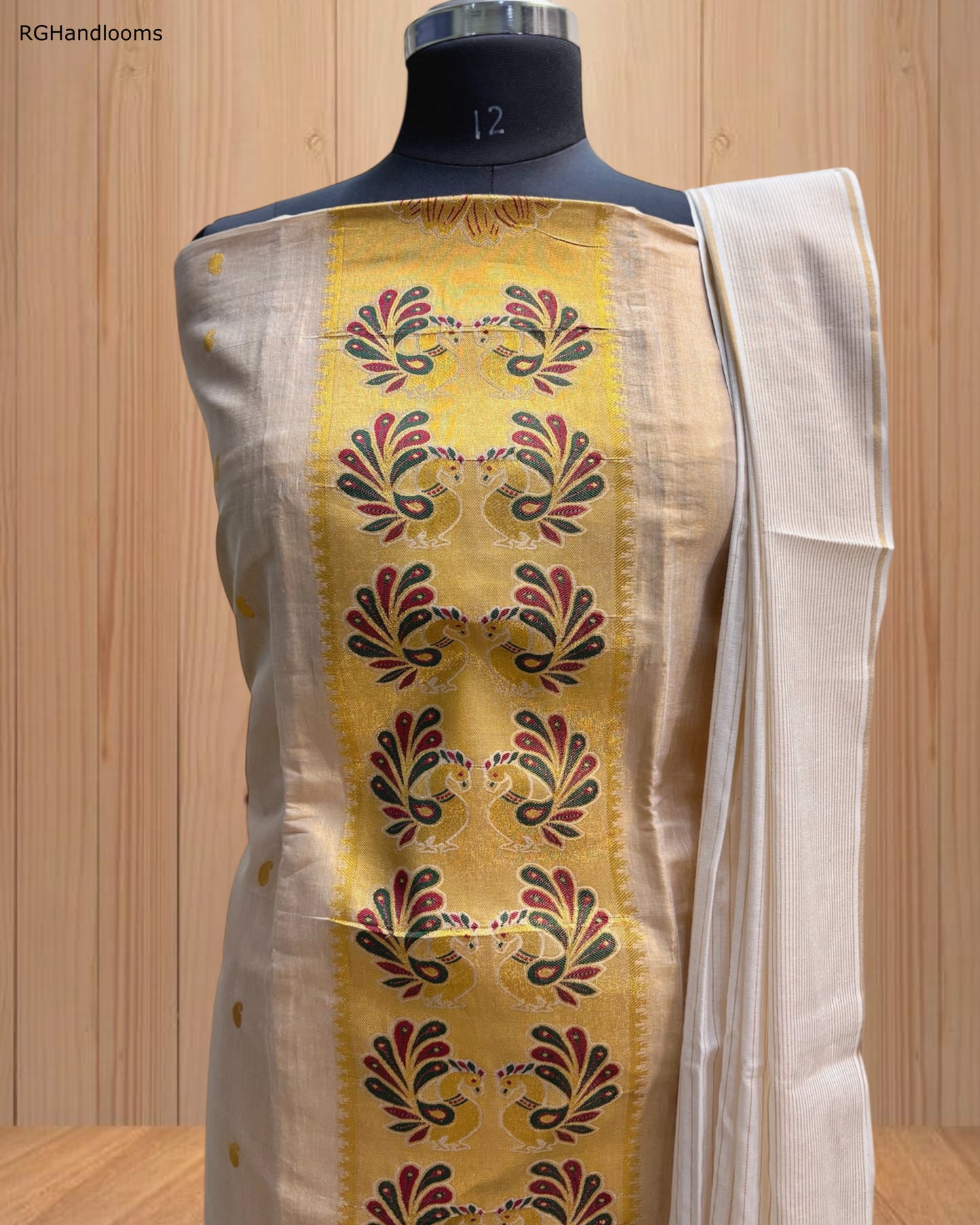 Ivory Churidar Material with Graceful Peacock Design & Golden Border