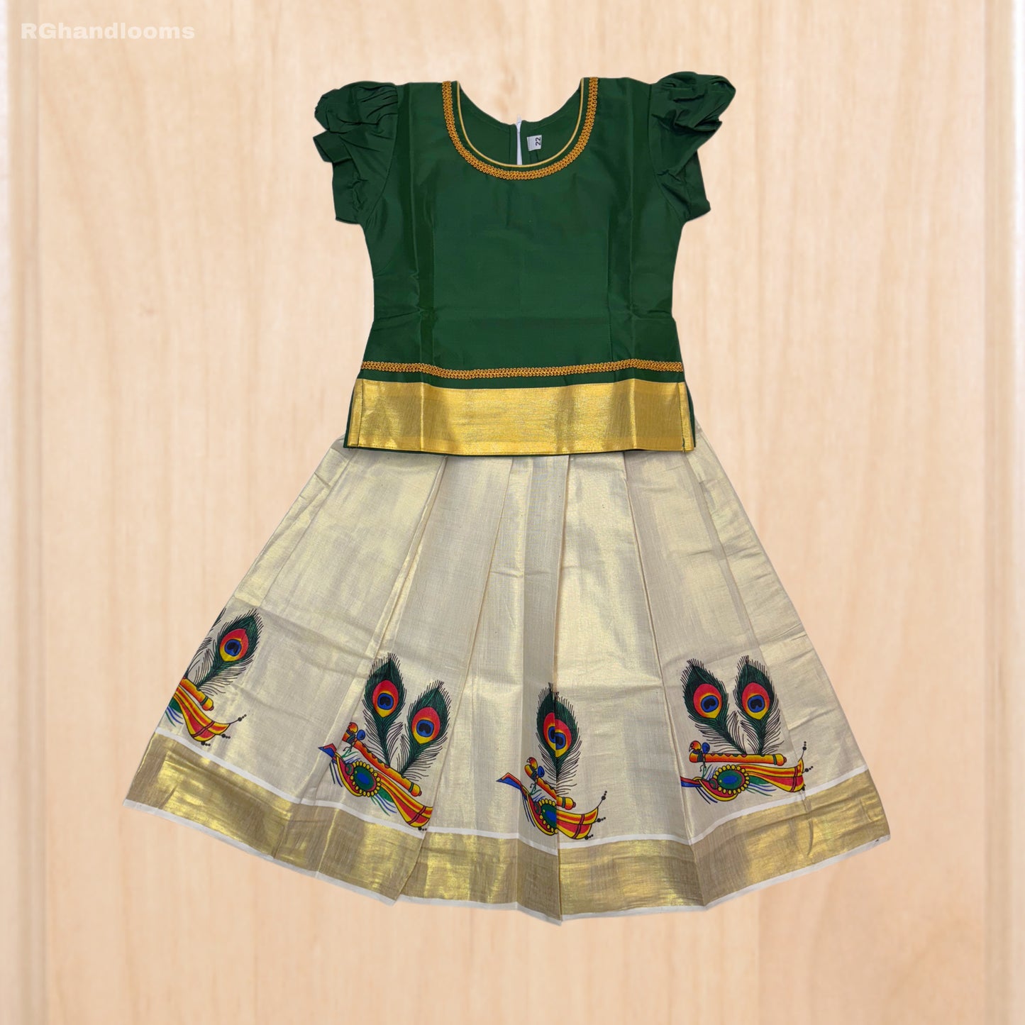 Green colour frock with peacock design