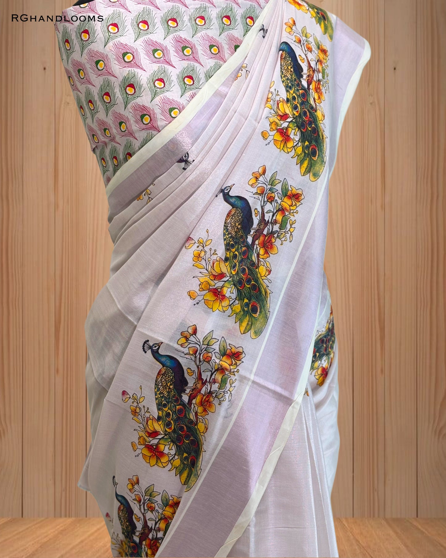 Pink Tissue Saree with Mural Print Peacock Design, paired with a stylish printed blouse
