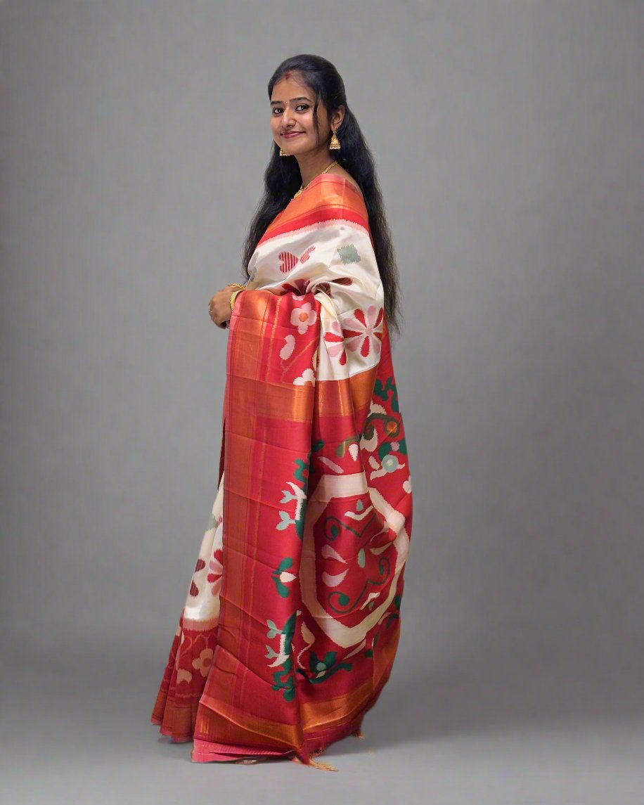 Handloom Silk Saree with Floral Design and Orange Border