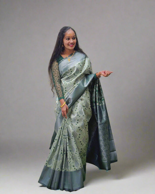 Handloom Green Silk Saree with Floral Motifs  Product Description: