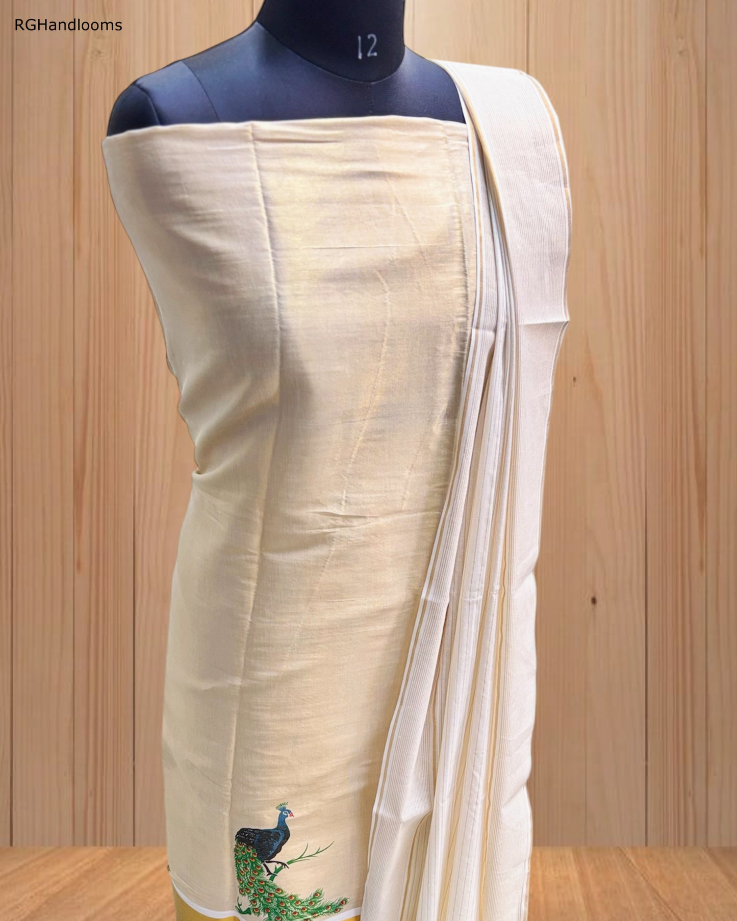 Ivory Churidar Material with Graceful Peacock Design & Golden Border