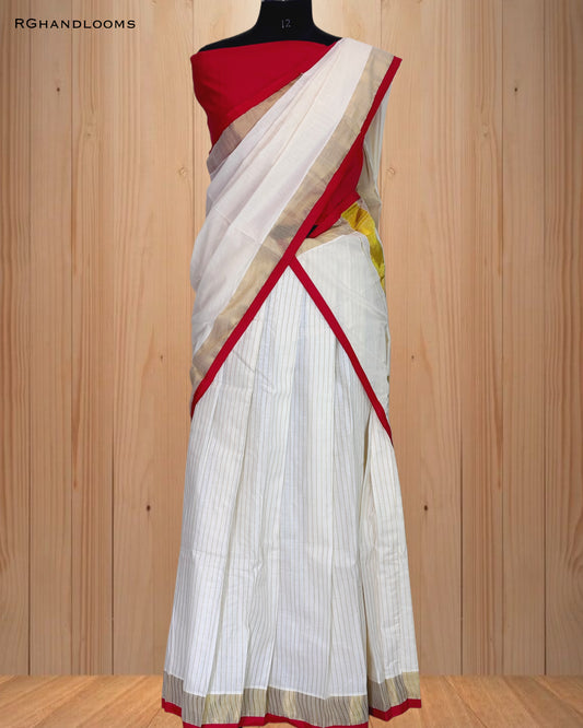 Kerala traditional dhavani set, adorned with a radiant red and golden border.