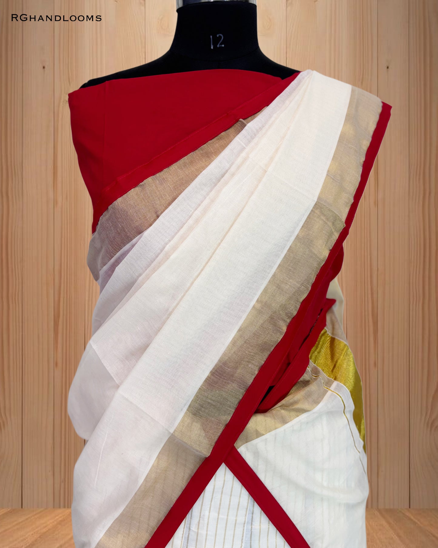 Kerala traditional dhavani set, adorned with a radiant red and golden border.