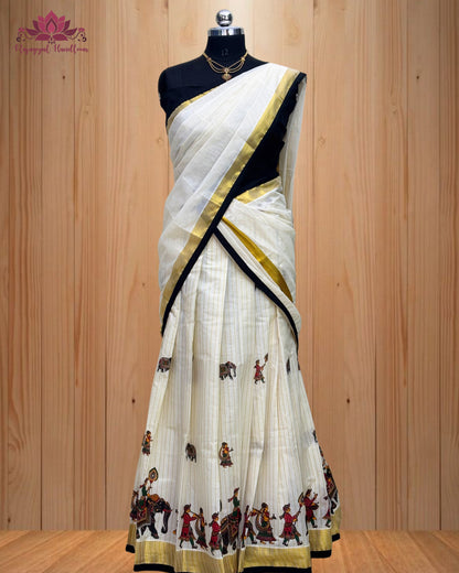 black and gold Dhawani set featuring a majestic elephant design.