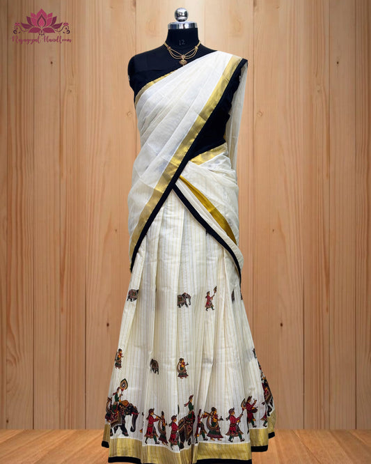 black and gold Dhawani set featuring a majestic elephant design.